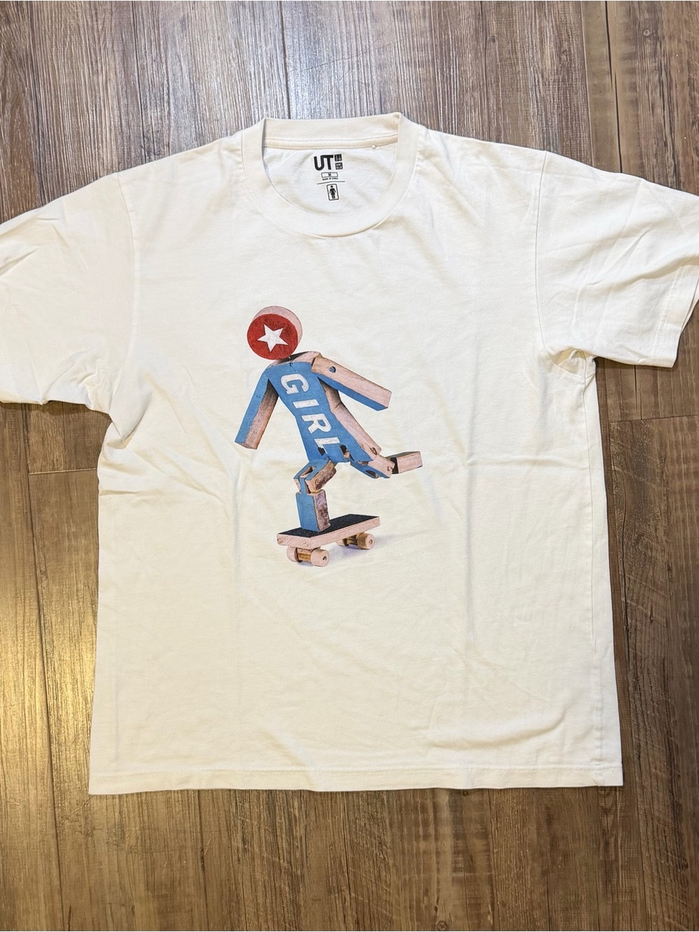 Uniqlo Cream Short-Sleeve Tee with Blue & Red Skate Graphic